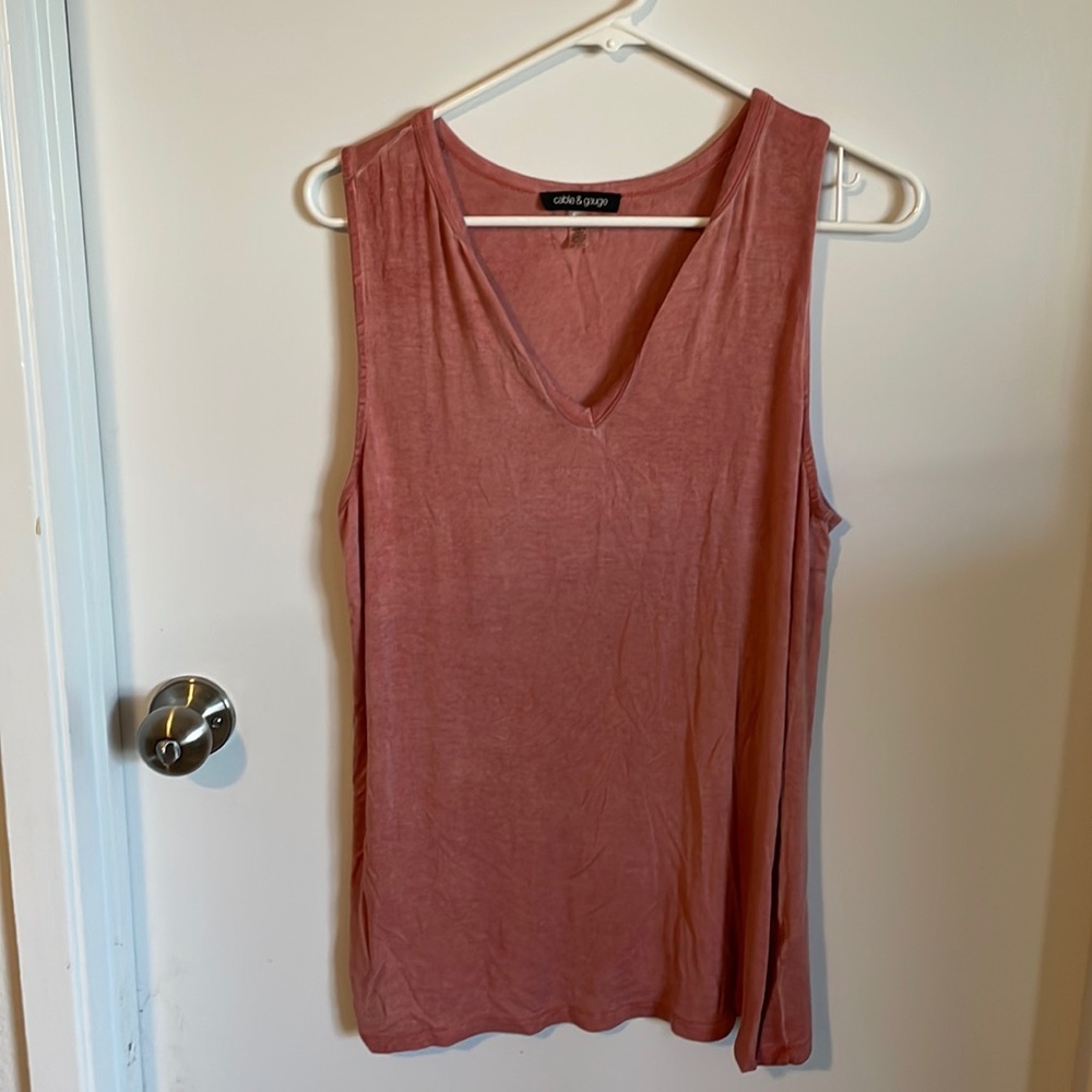 Nice no sleeve shirt, color is blush